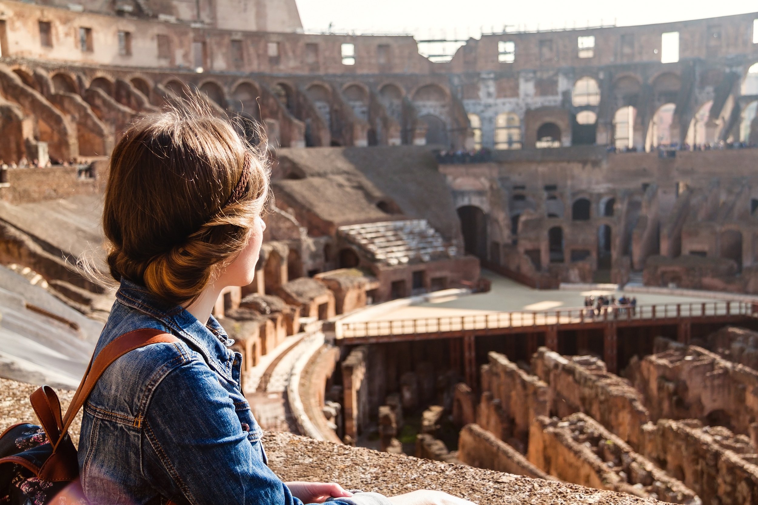 woman looking out over historical site