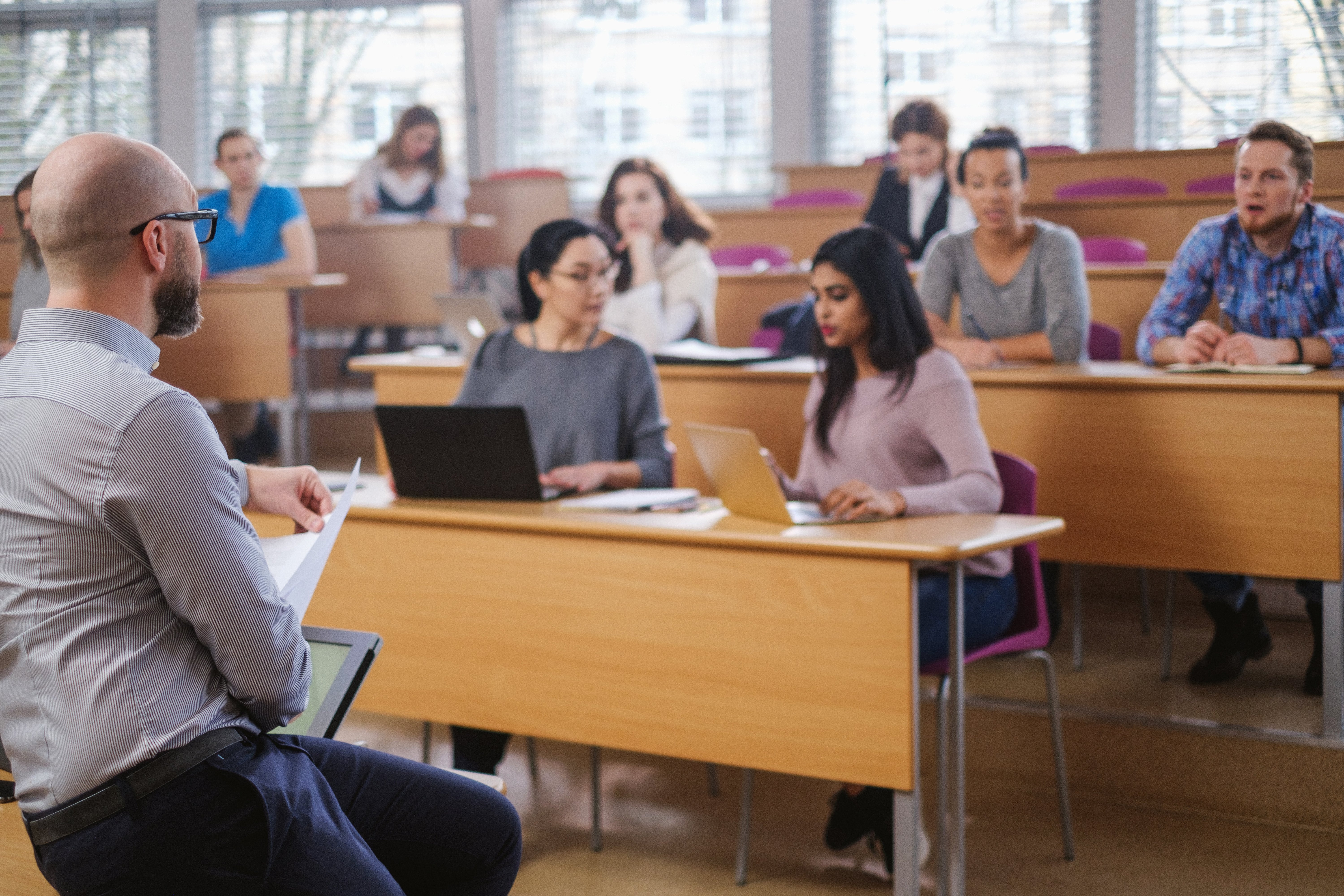 Multinational group of students in an auditorium