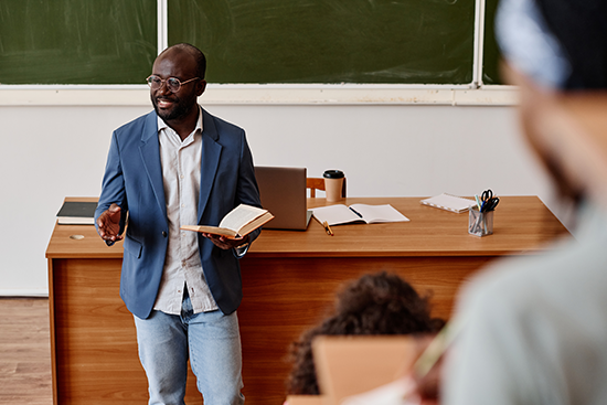 man lecturing at a university