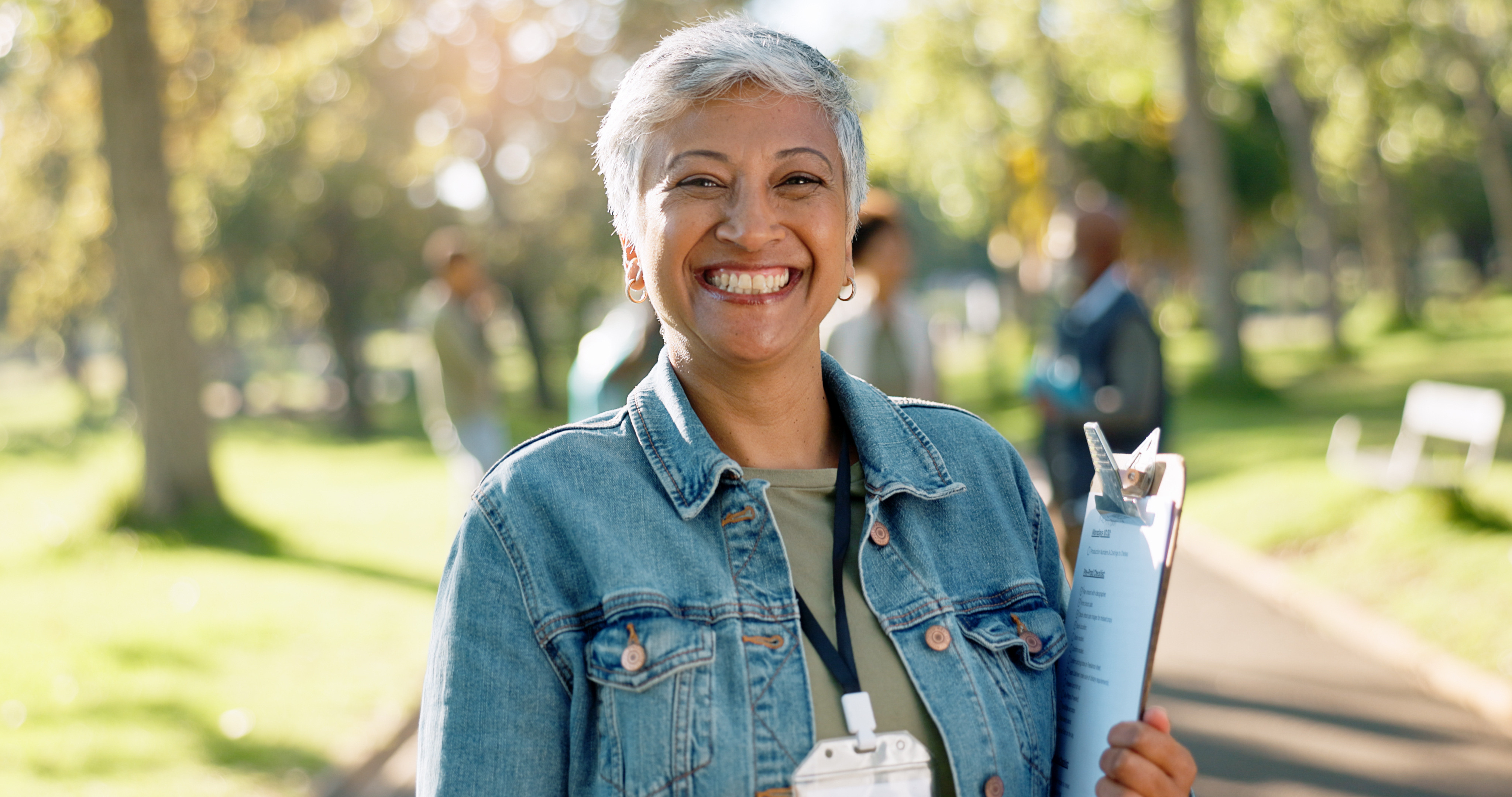  portrait of volunteer with clipboard for waste checklist, inspection and community service. 